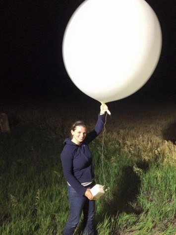 Jennifer Newman, Vice President, Atmospheric Science, REsurety, with a weather balloon.